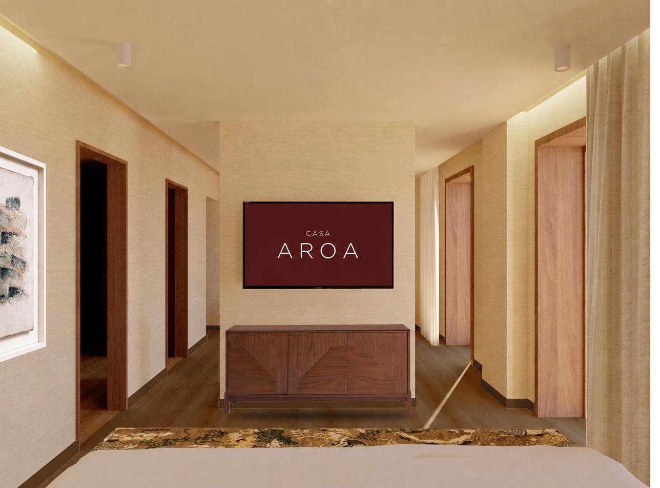 Zona de escritorio y TV en la Suite